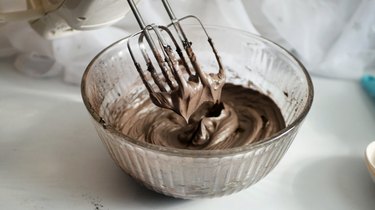 mixing chocolate buttercream