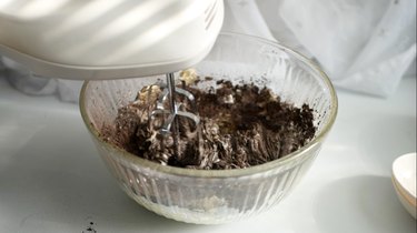 mixing chocolate buttercream