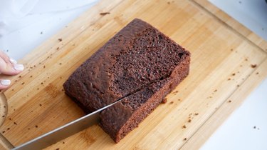 cutting the chocolate cake